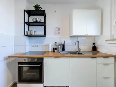 Küche/Küchenzeile in der Unterkunft BudgetRoom 3 Schlafzimmer Workers Home