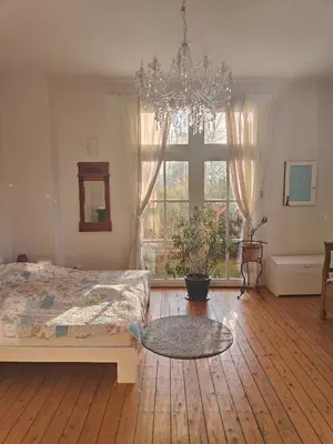 Ein Bett oder Betten in einem Zimmer der Unterkunft LöwenTal an der Ruhr mit Terrasse und mit Parkplatz
