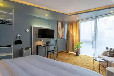 TV/Unterhaltungsangebot in der Unterkunft StayBaran Design Apartment - Essen Zentrum