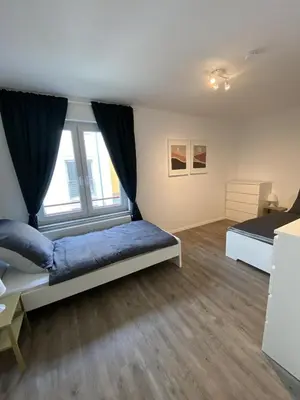 Ein Bett oder Betten in einem Zimmer der Unterkunft SAP18 fitter's apartment in Erkrath