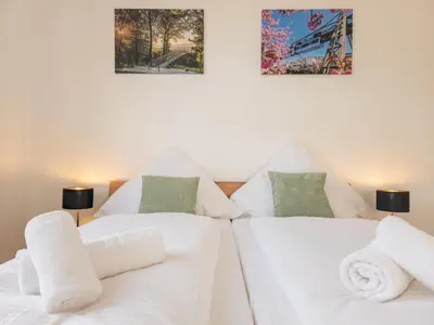 Ein Bett oder Betten in einem Zimmer der Unterkunft Wuppertal nähe DUS, 2 Bedrooms, Parking