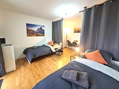 Ein Bett oder Betten in einem Zimmer der Unterkunft Moderne Wohnung mit Balkon und top Anbindung