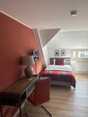 Ein Bett oder Betten in einem Zimmer der Unterkunft Rehmanns Hof