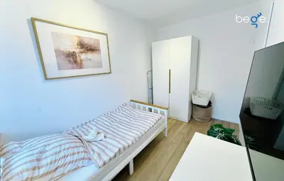 Ein Bett oder Betten in einem Zimmer der Unterkunft BEGE APARTMENTS InspireSpace