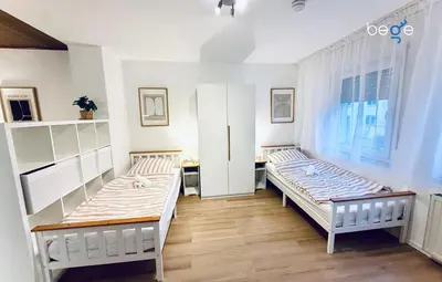 Ein Bett oder Betten in einem Zimmer der Unterkunft BEGE APARTMENTS InspireSpace