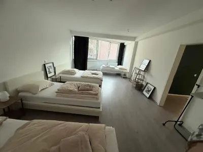 Ein Bett oder Betten in einem Zimmer der Unterkunft Loft-like Apartment 150 sqm near Veltins Arena