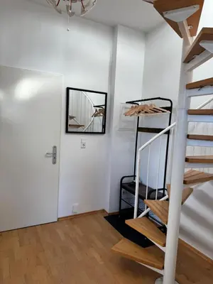 Ein Etagenbett oder Etagenbetten in einem Zimmer der Unterkunft Helle Dachgeschoßwohnung am Laurentiusplatz
