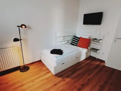 Ein Bett oder Betten in einem Zimmer der Unterkunft Case 3 BR 6 P Parking & Privat-Entry