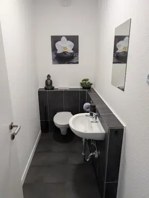 Ein Badezimmer in der Unterkunft Ferienwohnung Gästehaus Bauer 1