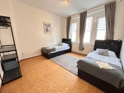 Ein Bett oder Betten in einem Zimmer der Unterkunft Gevelsberg, attraktive Lage für Geschäftsleute, Monteure, 4 Zimmer, Wlan, SmartTV