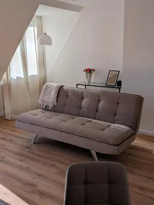Ein Sitzbereich in der Unterkunft Komplett renovierte Design-Wohnung in Stadtnähe