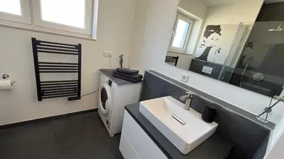 Ein Badezimmer in der Unterkunft Neue und modische Wohnung im Duisburger Süden