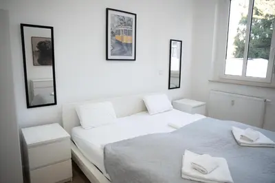 Ein Bett oder Betten in einem Zimmer der Unterkunft Design Apartment - Solingen-Mitte - Balkon
