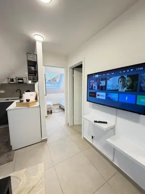 TV/Unterhaltungsangebot in der Unterkunft Modernes Apartment mit Smart-TV & WLAN nahe Messe