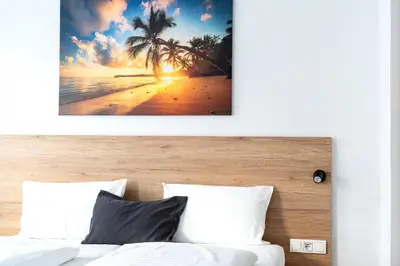 Ein Bett oder Betten in einem Zimmer der Unterkunft LivInn by Trotmannia
