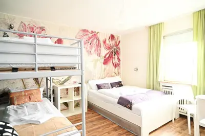 Ein Bett oder Betten in einem Zimmer der Unterkunft Self check in City Hostel Nordstern