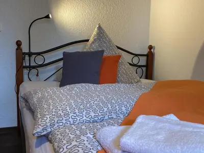 Ein Bett oder Betten in einem Zimmer der Unterkunft Hotelik Gdanska