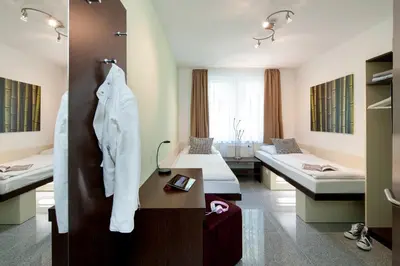 Ein Bett oder Betten in einem Zimmer der Unterkunft SleepinRoomz Boutique Hotel Dortmund-West