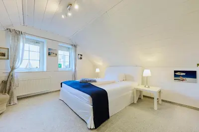 Ein Bett oder Betten in einem Zimmer der Unterkunft Hotel Gut Moschenhof