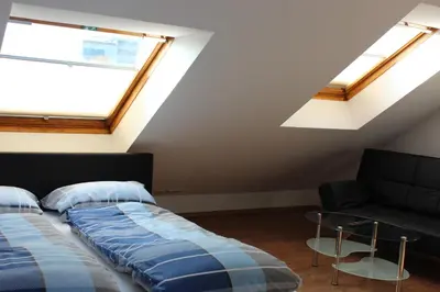 Ein Bett oder Betten in einem Zimmer der Unterkunft Ferienwohnung