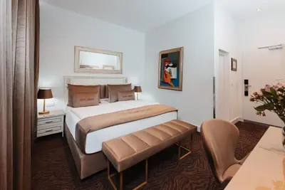 Ein Bett oder Betten in einem Zimmer der Unterkunft Hotel Unique Dortmund Hauptbahnhof