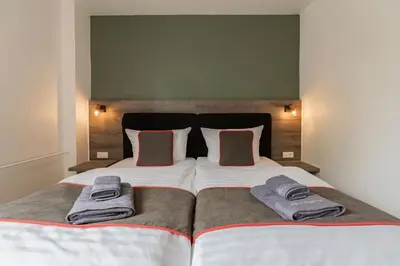 Ein Bett oder Betten in einem Zimmer der Unterkunft Hotel Enger Hof