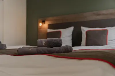 Ein Bett oder Betten in einem Zimmer der Unterkunft Hotel Enger Hof
