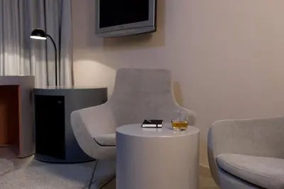 Ein Sitzbereich in der Unterkunft The Grey Design Hotel