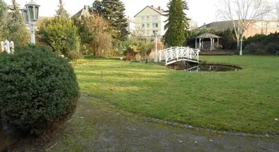 Ein Garten an der Unterkunft Hotel Specht