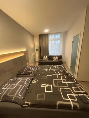 Ein Bett oder Betten in einem Zimmer der Unterkunft Burbaums Restaurant Hotel