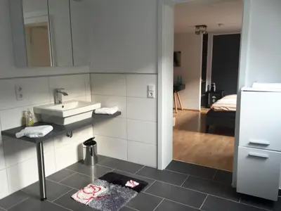 Ein Bett oder Betten in einem Zimmer der Unterkunft Burbaums Restaurant Hotel