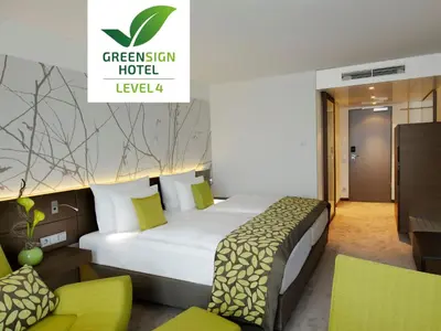 Ein Bett oder Betten in einem Zimmer der Unterkunft Atlantic Congress Hotel Essen