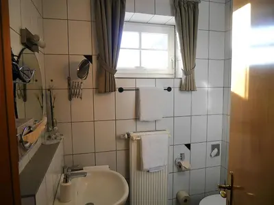 Ein Badezimmer in der Unterkunft Gästezimmer Lammersmann