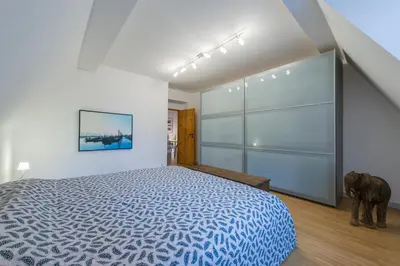 Ein Bett oder Betten in einem Zimmer der Unterkunft Apartment Essen- Bredeney