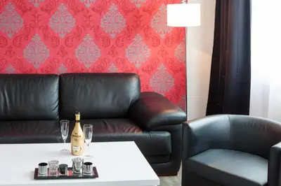Ein Sitzbereich in der Unterkunft Hotel Stay