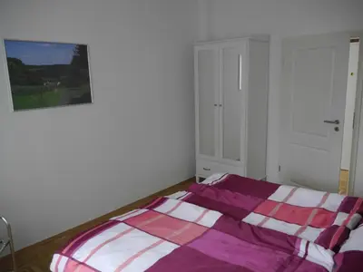 Ein Bett oder Betten in einem Zimmer der Unterkunft Schöne Ferien und Messewohnung Nähe Düsseldorf und Köln