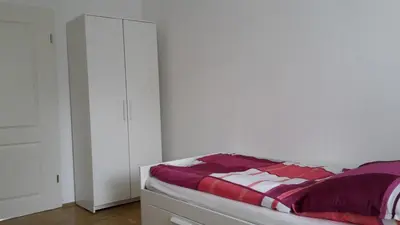 Ein Bett oder Betten in einem Zimmer der Unterkunft Schöne Ferien und Messewohnung Nähe Düsseldorf und Köln