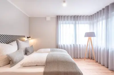 Ein Bett oder Betten in einem Zimmer der Unterkunft The Woodmans Airport Boardinghouse