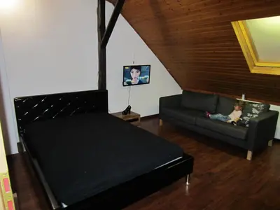 Ein Sitzbereich in der Unterkunft Monteur Apartment Charlotte