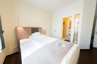 Ein Bett oder Betten in einem Zimmer der Unterkunft Landhotel Alte Töpferei