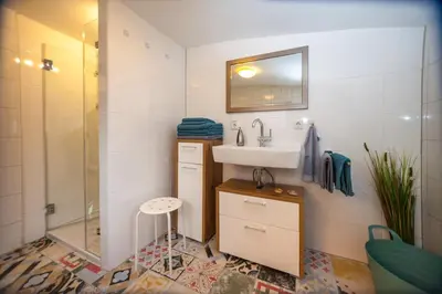 Ein Badezimmer in der Unterkunft Apartmenthaus Lorbach