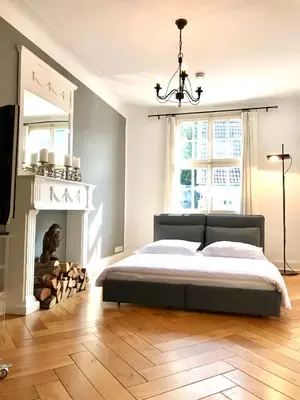 Ein Bett oder Betten in einem Zimmer der Unterkunft Townhouse Solingen