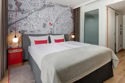 Ein Bett oder Betten in einem Zimmer der Unterkunft IntercityHotel Duisburg