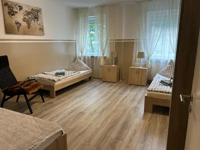 Ein Bett oder Betten in einem Zimmer der Unterkunft Ferienwohnung
