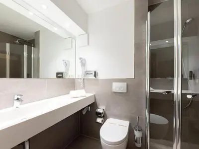 Ein Badezimmer in der Unterkunft Hotel im Park