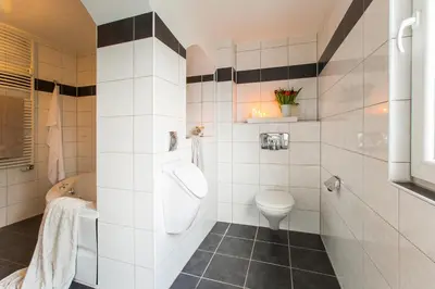 Ein Badezimmer in der Unterkunft Neanderappartement