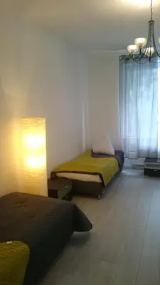 Ein Bett oder Betten in einem Zimmer der Unterkunft AVI City Apartments GoodHouse
