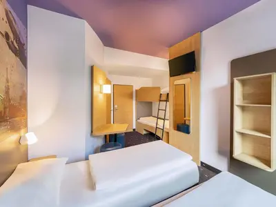 Ein Bett oder Betten in einem Zimmer der Unterkunft B&B Hotel Düsseldorf-Airport