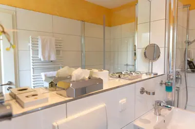 Ein Badezimmer in der Unterkunft Hotel Landhaus Knappmann