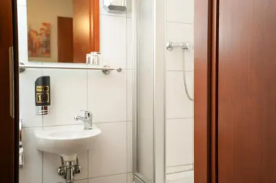 Ein Badezimmer in der Unterkunft Hotel Frohnhauser Hof
